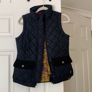 Black quilted vest, pattern inside